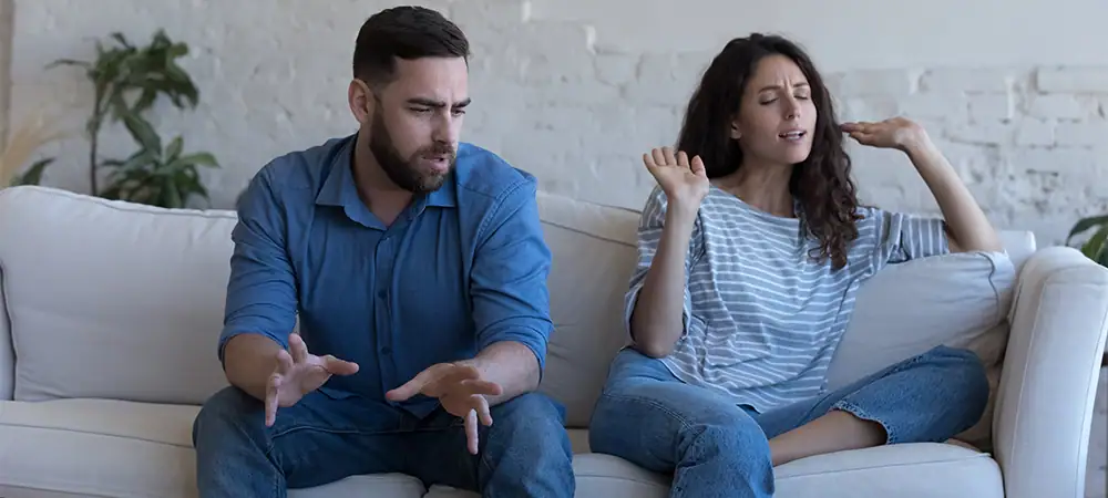 angry couple talking in emotional conflict, arguing, shouting