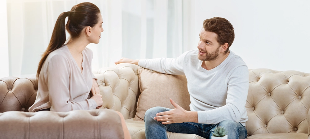 Good looking friendly colleagues discussing the project